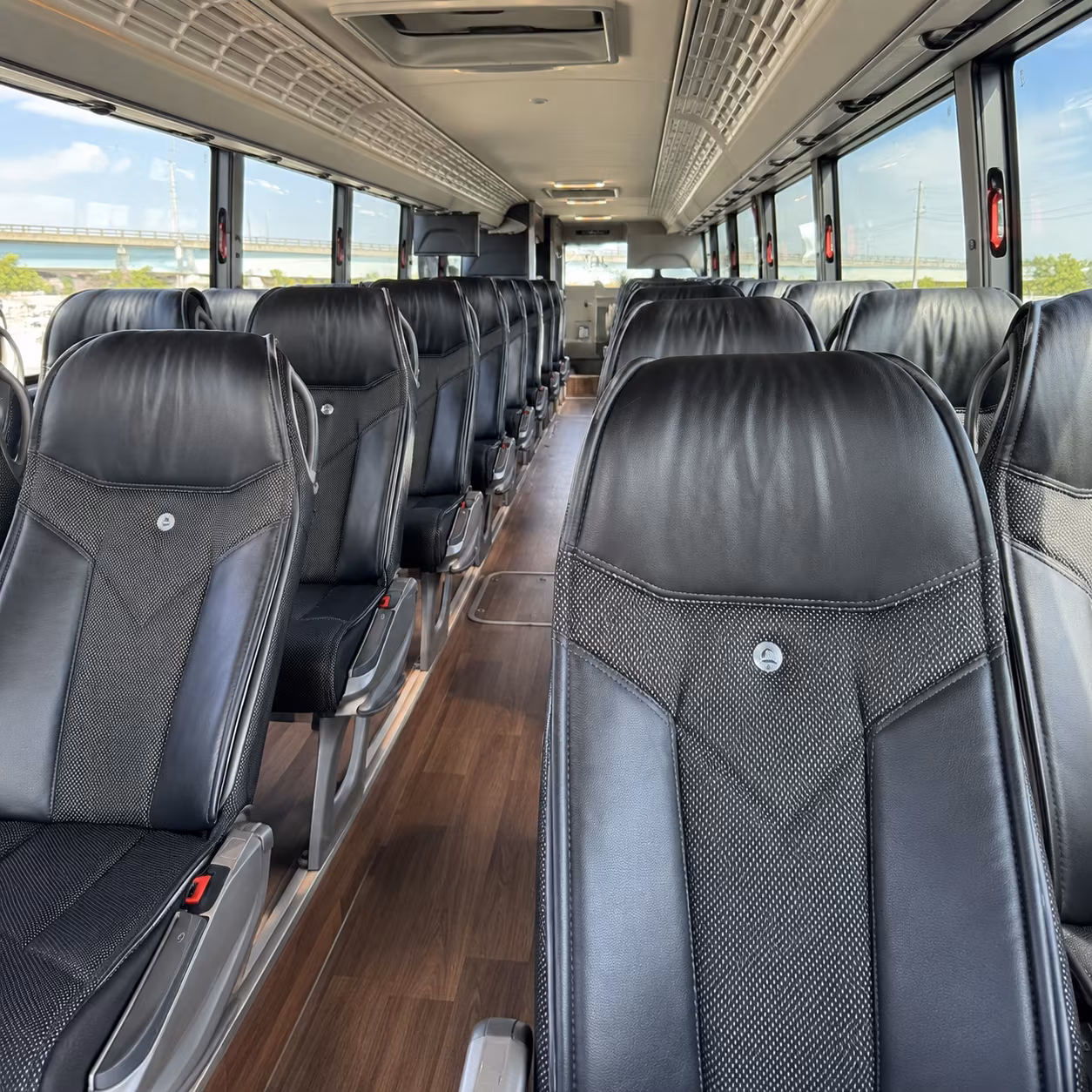 long distance bus rentals from west bloomfield to detroit metro area venues